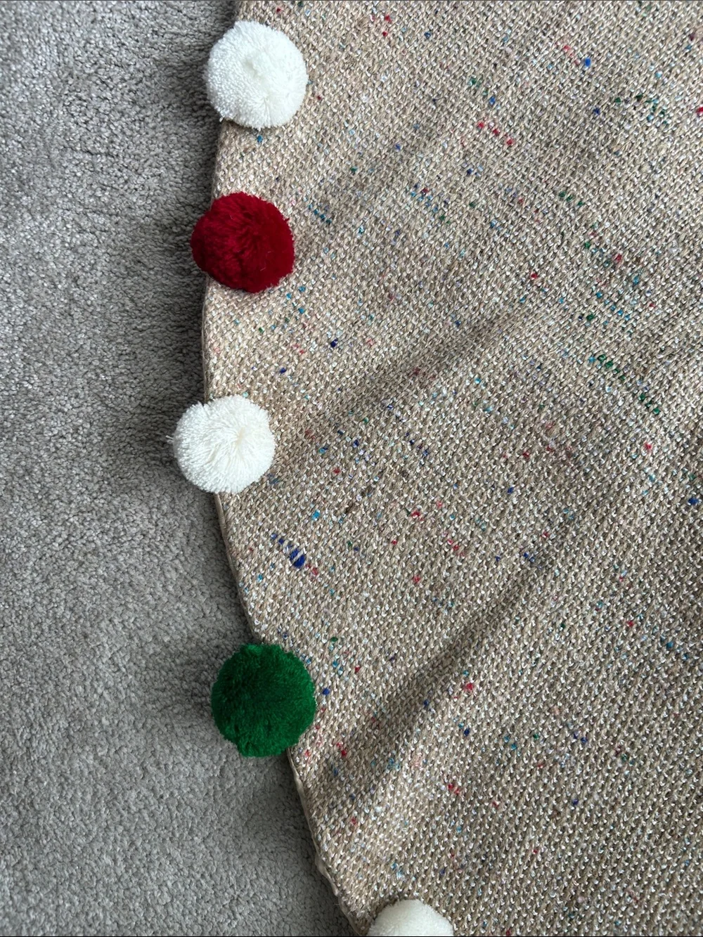 Kirkland's burlap Christmas Tree Skirt with Festive Pom Accents